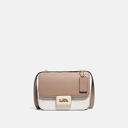 coach shearling bolsa