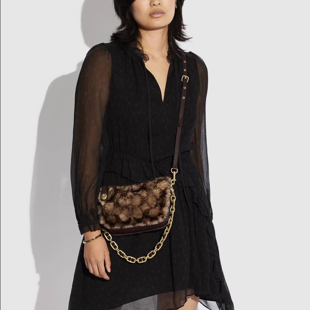 coach shearling bolsa