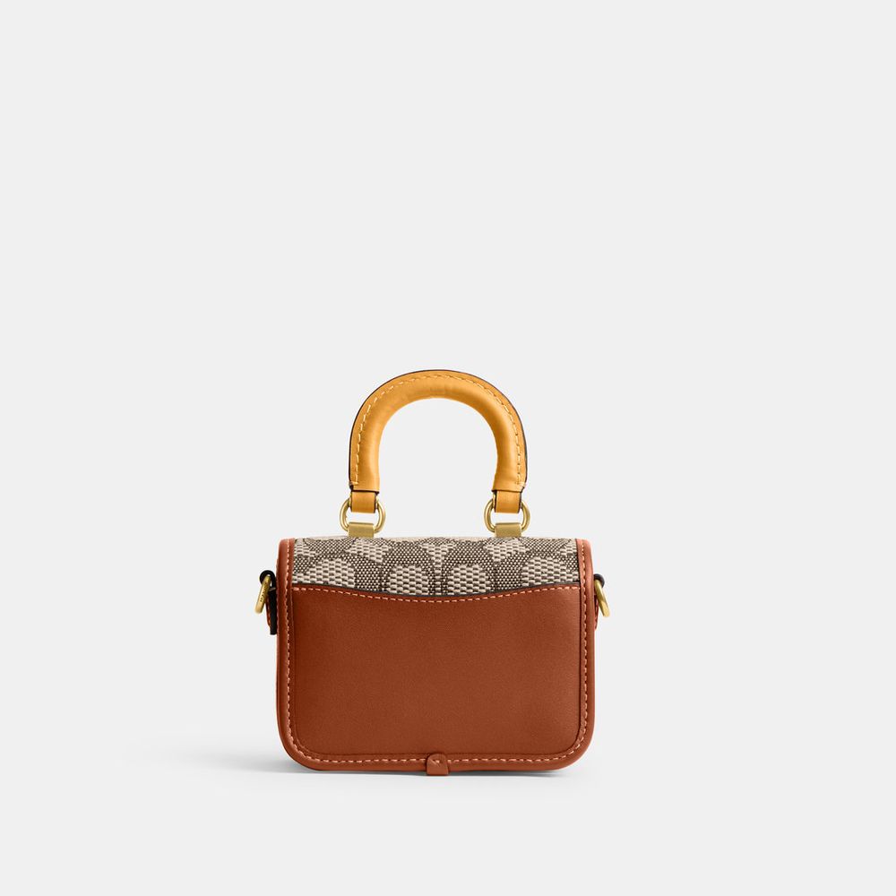 Bolsa Rogue Top Handle 12 Signature Jacquard Coach Marrom - coach